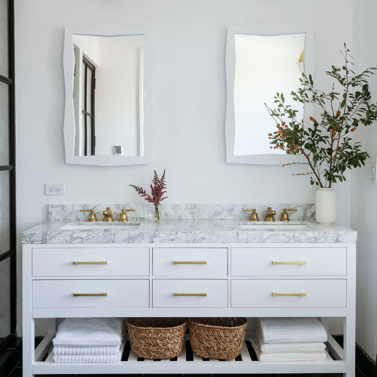 Two modern white oak medicine cabinets featured in a modern bathroom