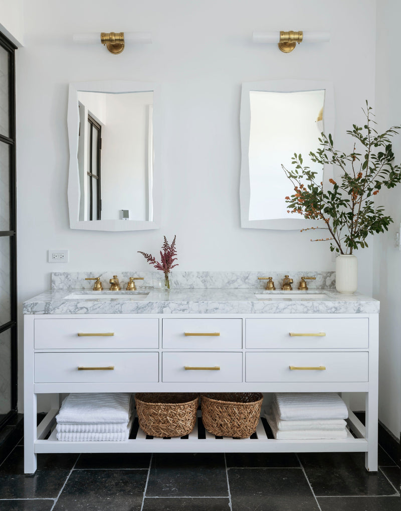 Two modern white oak medicine cabinets featured in a modern bathroom