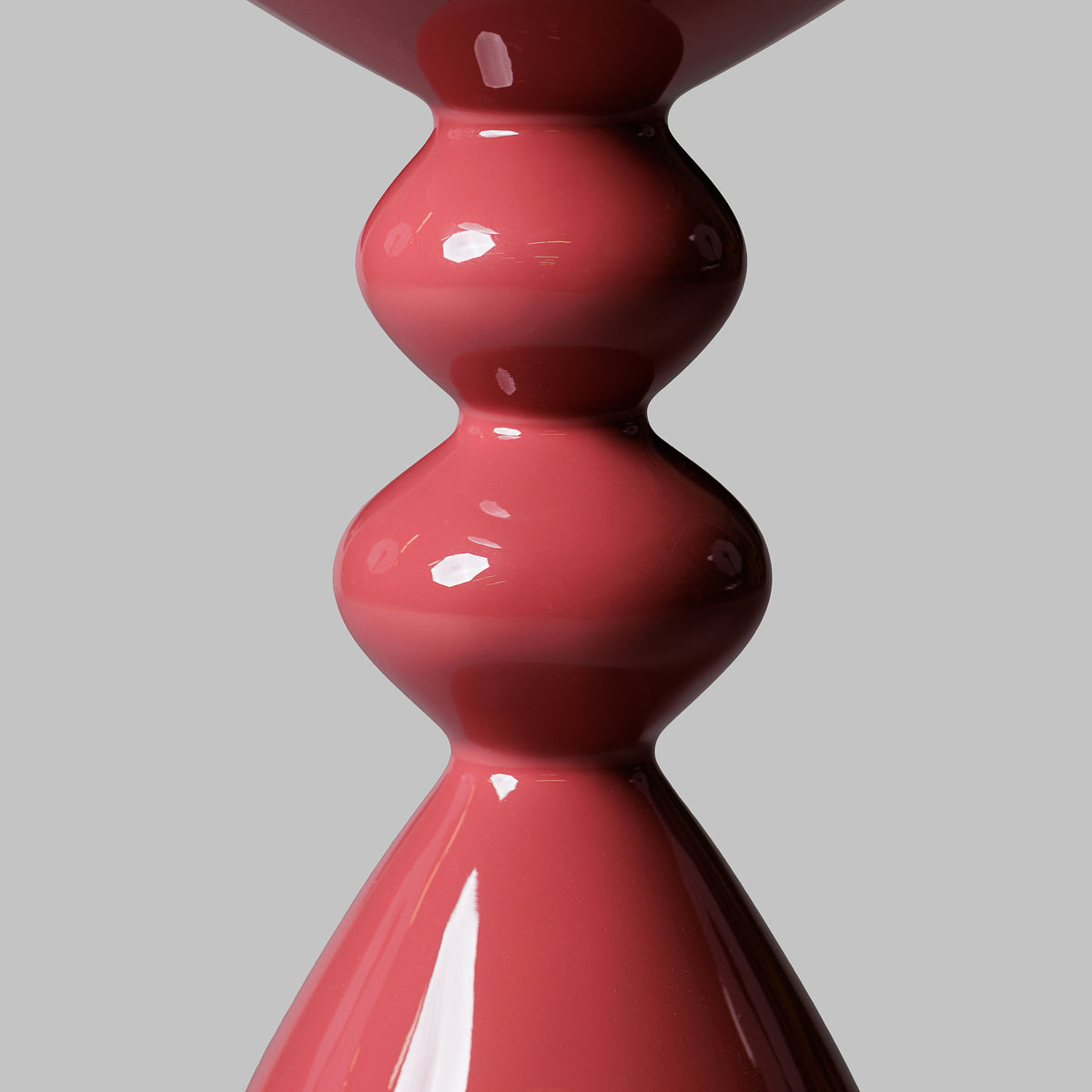 Close up of Modern Raspberry High Gloss Lacquer Finish Snap Side Table