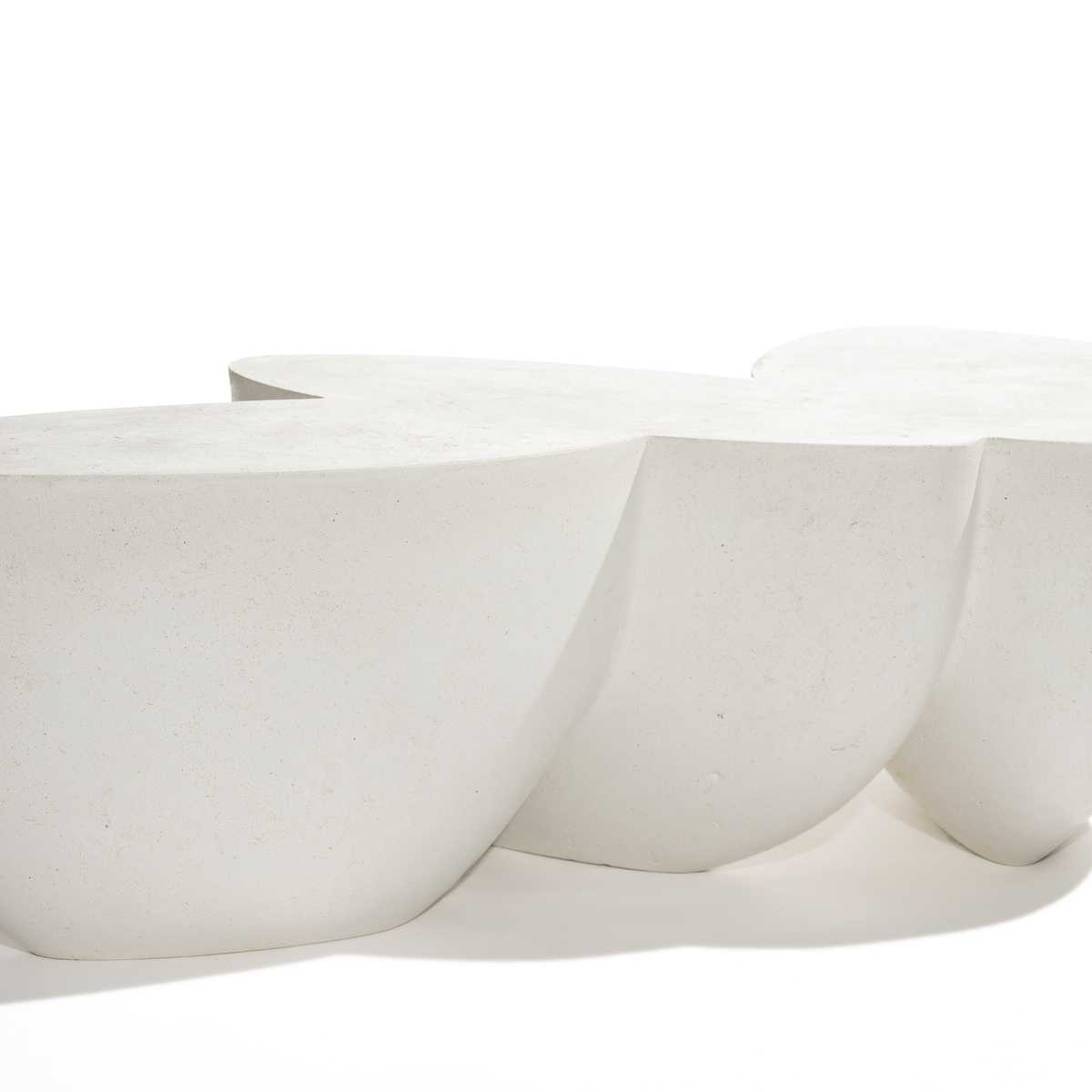 Modern concrete bench with a white background
