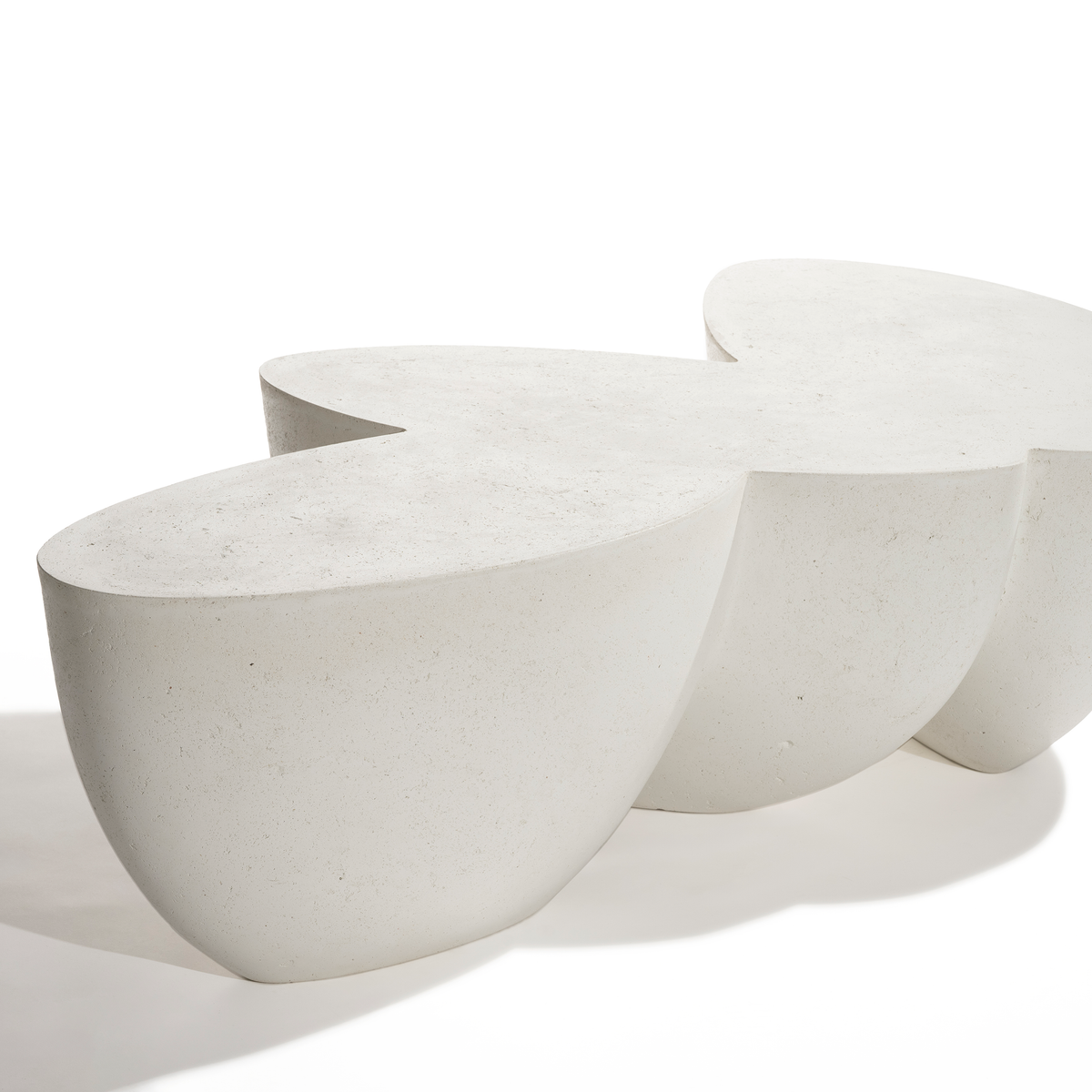 Modern concrete bench with a white background
