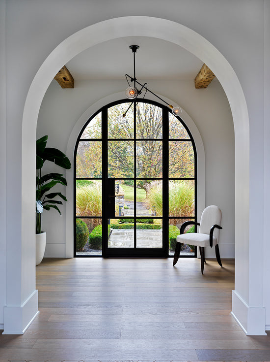Arch leading into a foyer 