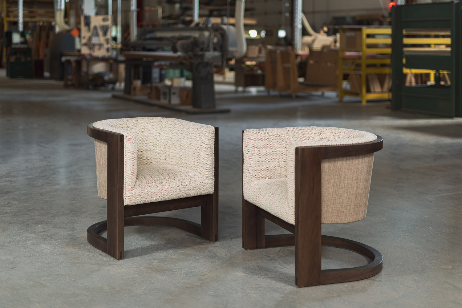 Two modern chairs in a factory 